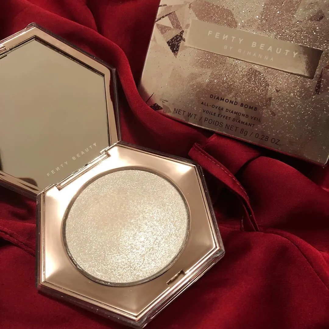 Fenty Beauty Diamond Bomb high gloss powder in compact with diamond-cut packaging