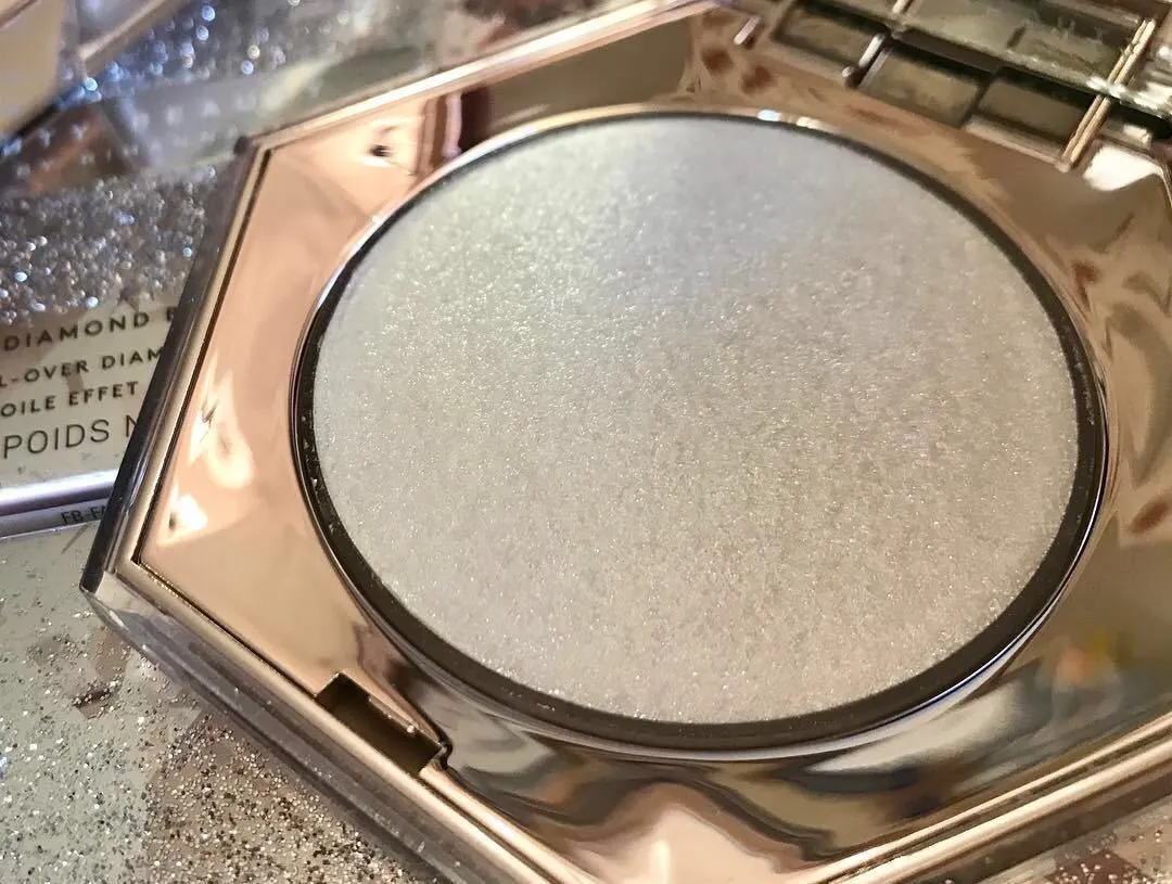 Fenty Beauty Diamond Bomb high gloss powder in compact with diamond-cut packaging