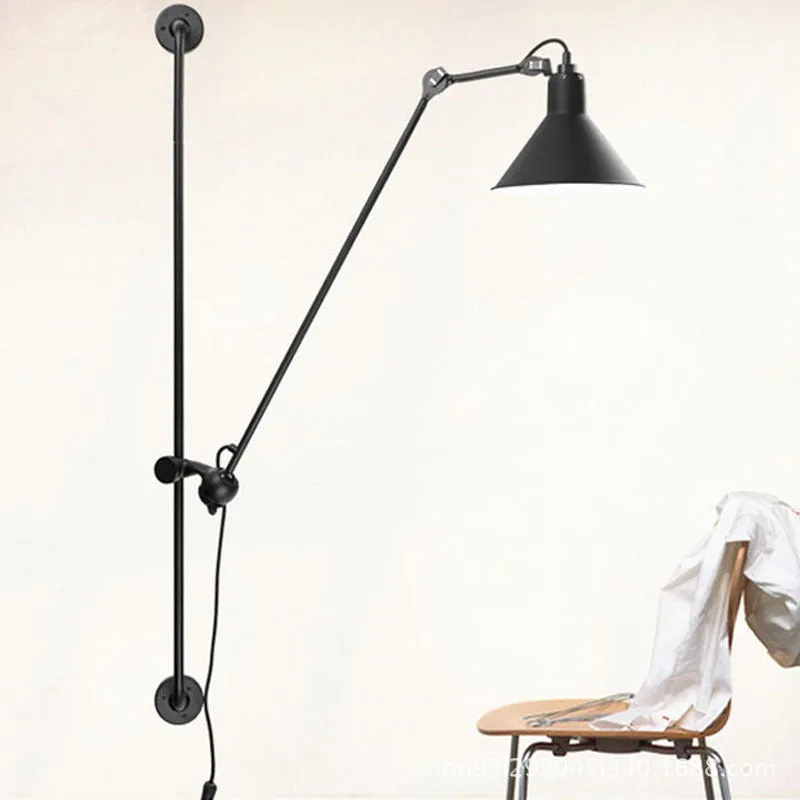 Black rotating rocker arm eye protection wall lamp with plug and Nordic iron lampshade showing warm bulb