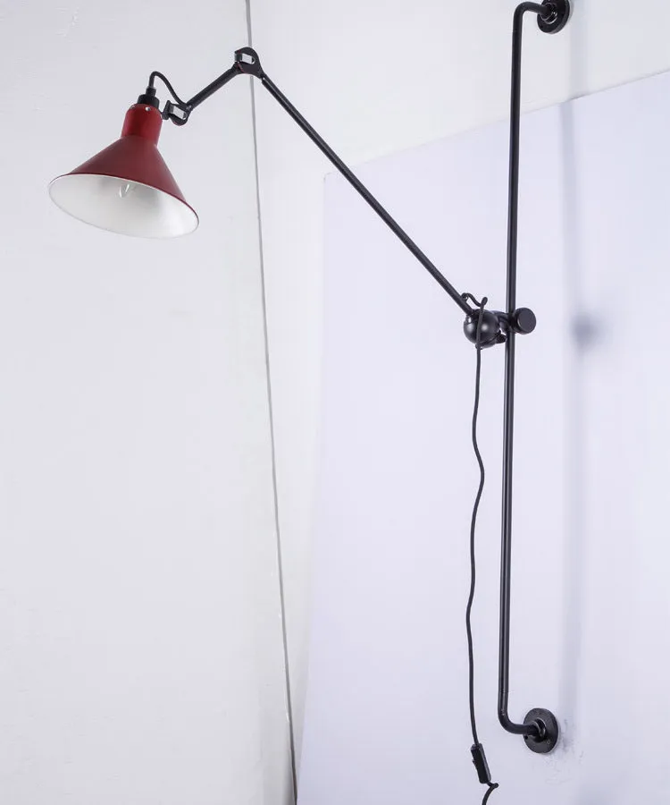 Black rotating rocker arm eye protection wall lamp with plug and Nordic iron lampshade showing warm bulb