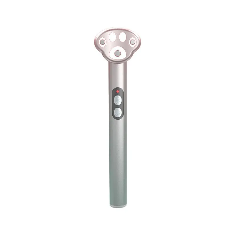 Gradient pink Cat's Paw shape micro-current eye massager with colour light therapy on a white background.