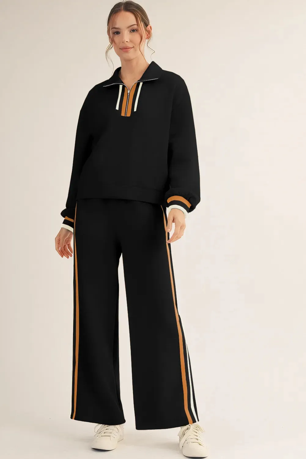 Black striped patchwork quarter zip pullover and loose trousers loungewear set on model