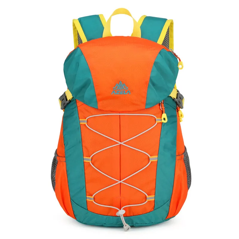 AZELA 20L Color Block Lightweight Hiking Backpack in orange and black, front view, on a rocky outdoor surface