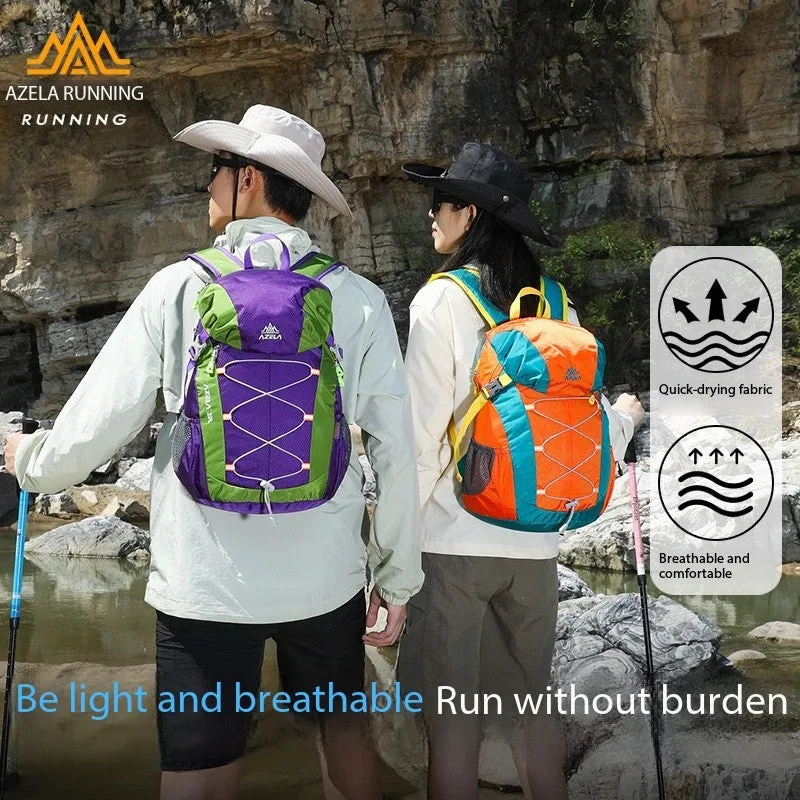 AZELA 20L Color Block Lightweight Hiking Backpack in orange and black, front view, on a rocky outdoor surface