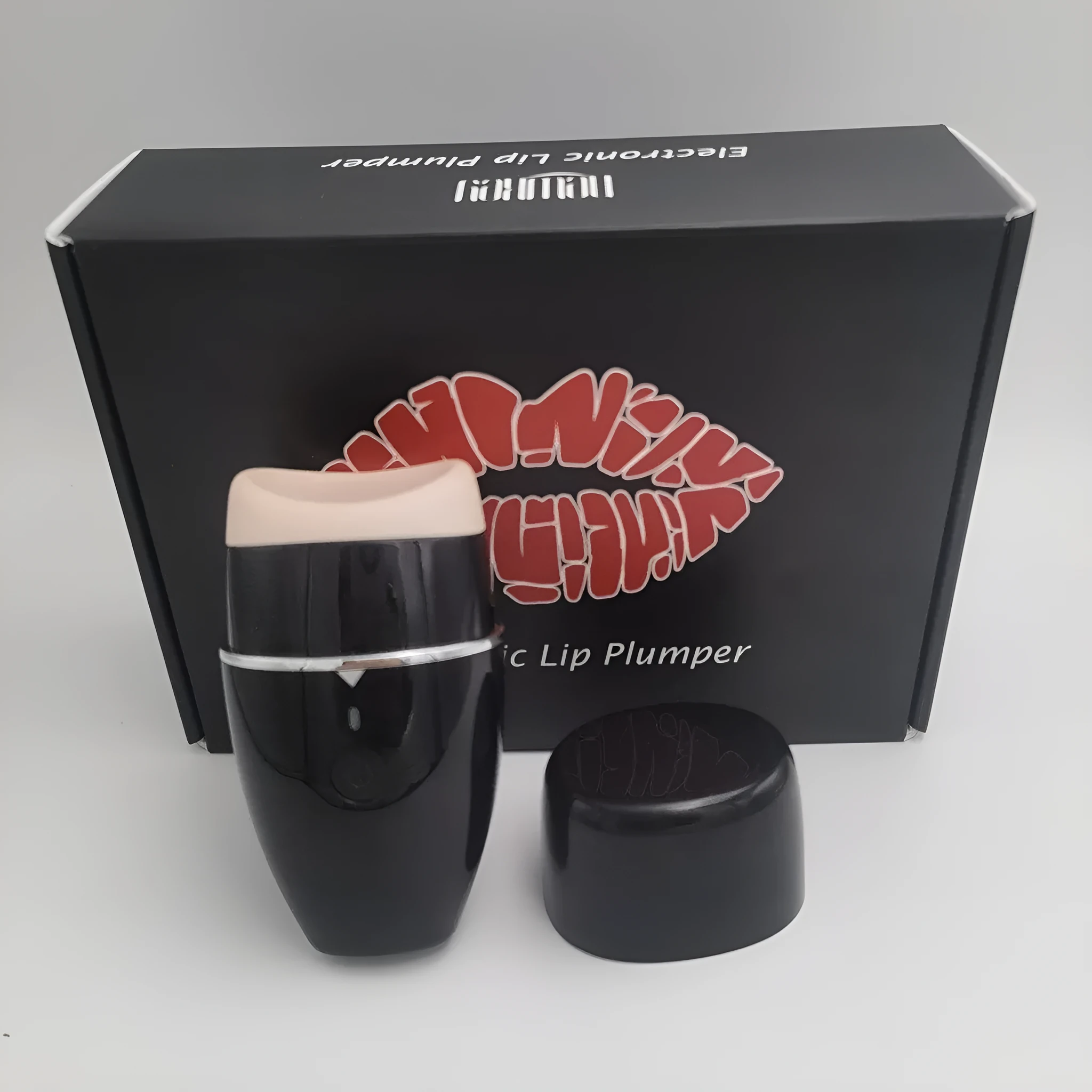 Electric lip plumper device with USB cable in black or white colour options