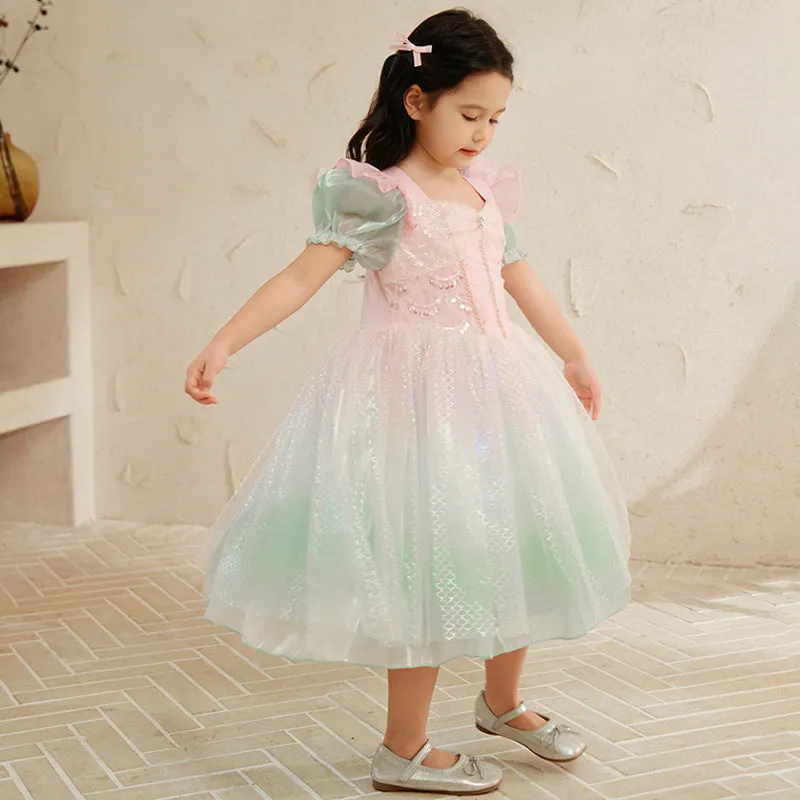 Little girl cotton gauze princess dress with short sleeves, puff sleeve mermaid style, in a solid colour for a wedding or birthday party