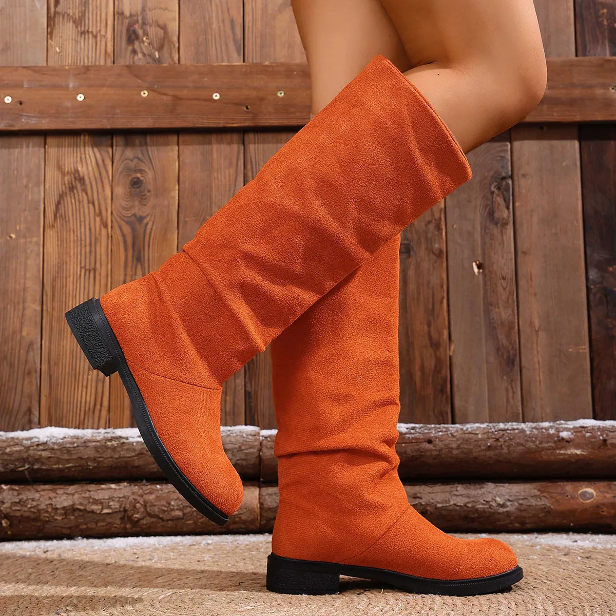 Women's cow suede high leg boots with chunky heel, below the knee, available in multiple colours, side view