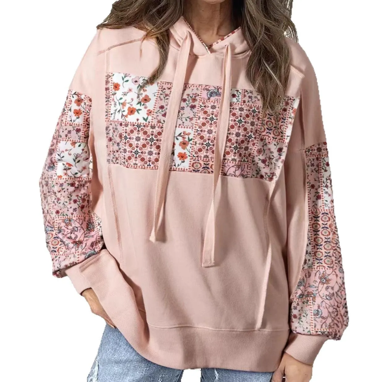 Women's pullover hoodie with drawstrings, loose fit, long sleeves, in pink colour, front view