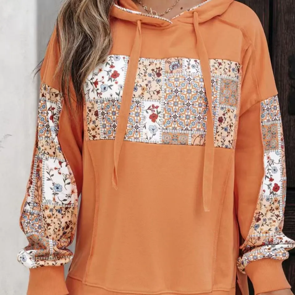 Women's pullover hoodie with drawstrings, loose fit, long sleeves, in pink colour, front view