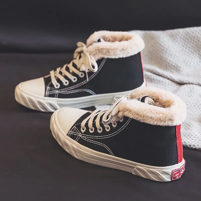 Black women's winter canvas shoes with velvet lining, animal pattern, buckle fastening, low-top rubber sole.