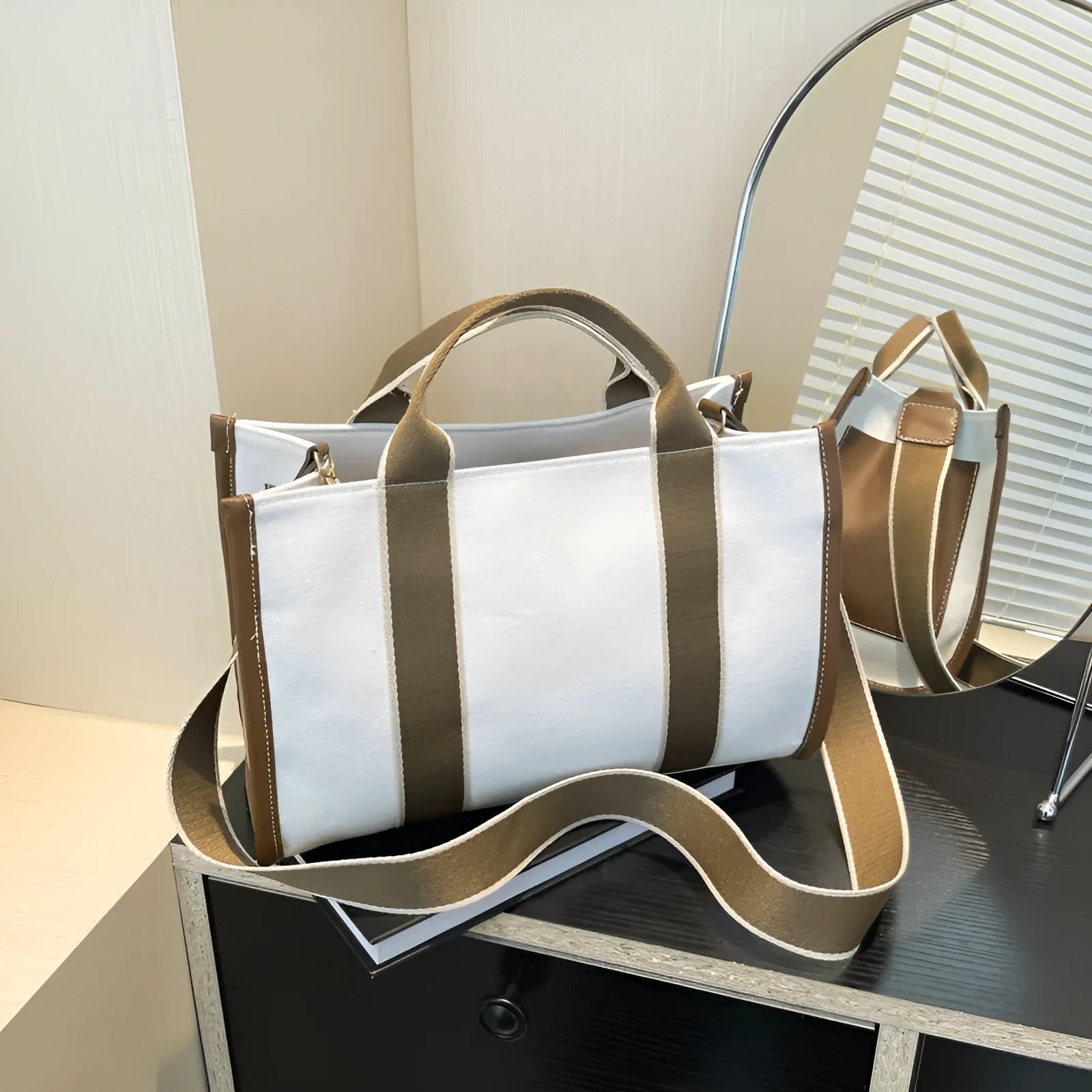 Large-capacity canvas tote bag in black with open pocket, horizontal square shape, single shoulder strap