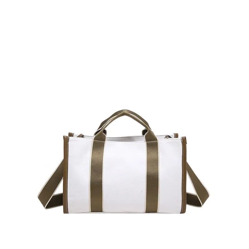 Large-capacity canvas tote bag in black with open pocket, horizontal square shape, single shoulder strap