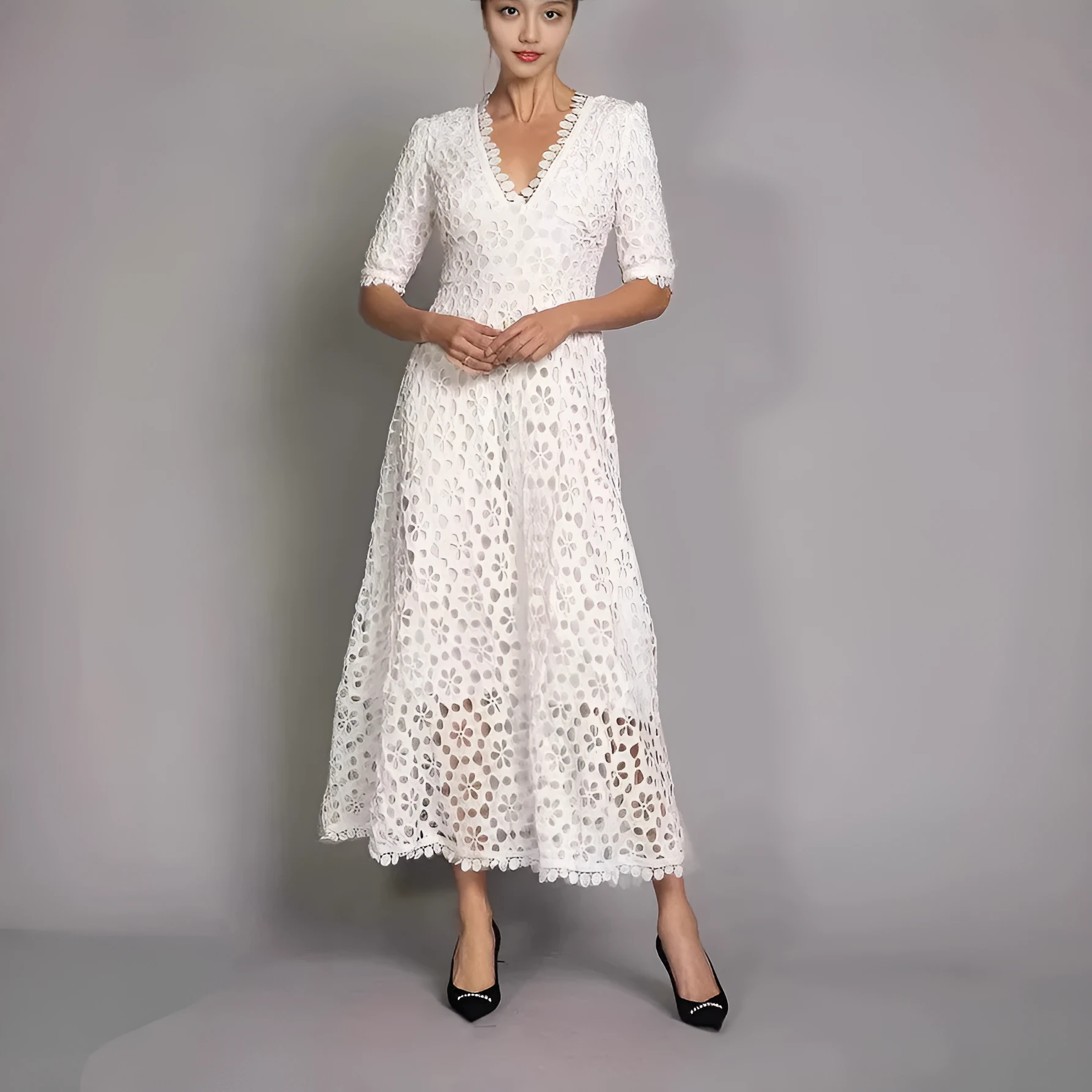 White lace long dress with V-neck design and hollow-out details for women
