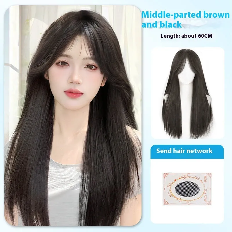 Long straight black synthetic wig with full blunt bangs on a wig stand.