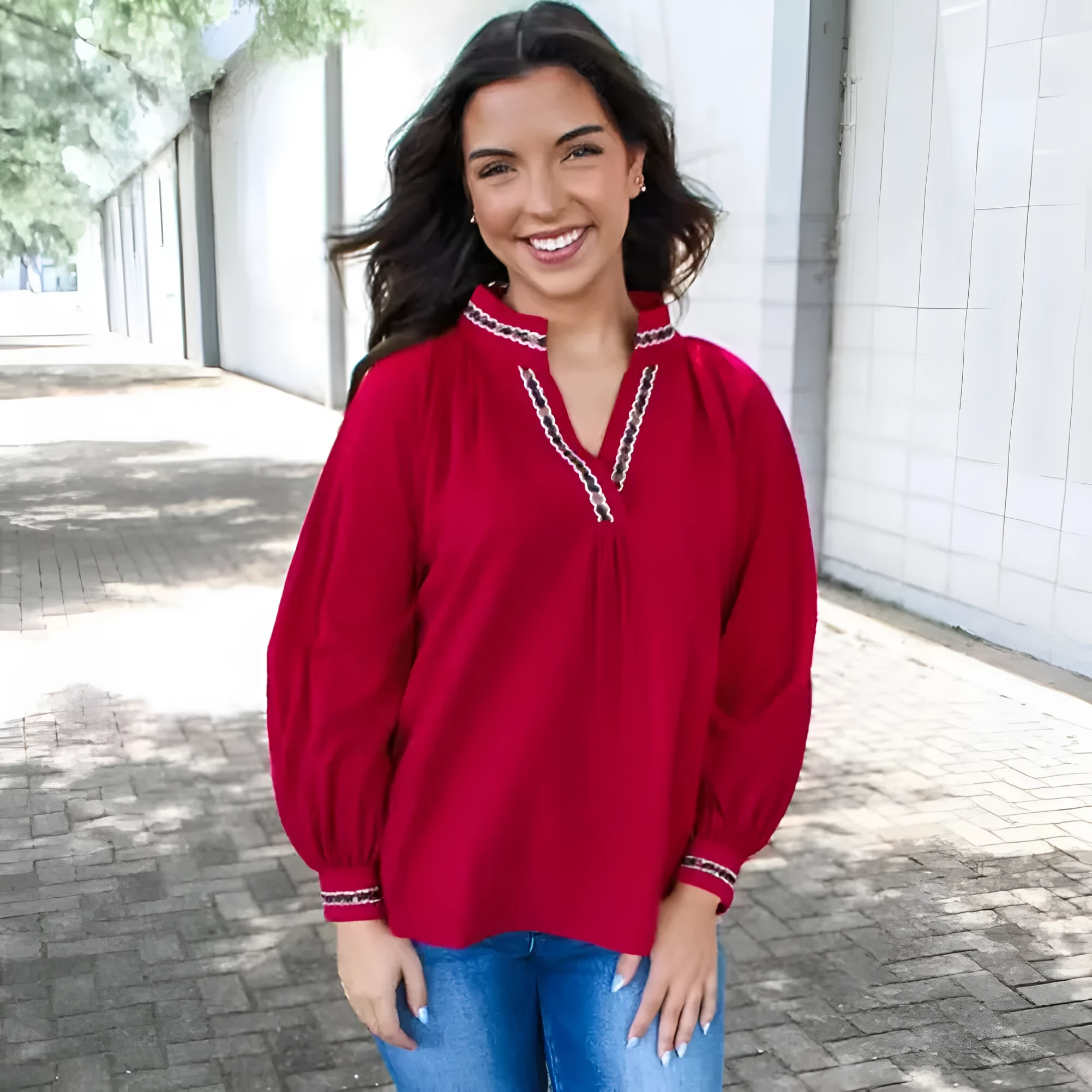 Women's red polyester pullover shirt with embroidered collar and printed design, loose fit