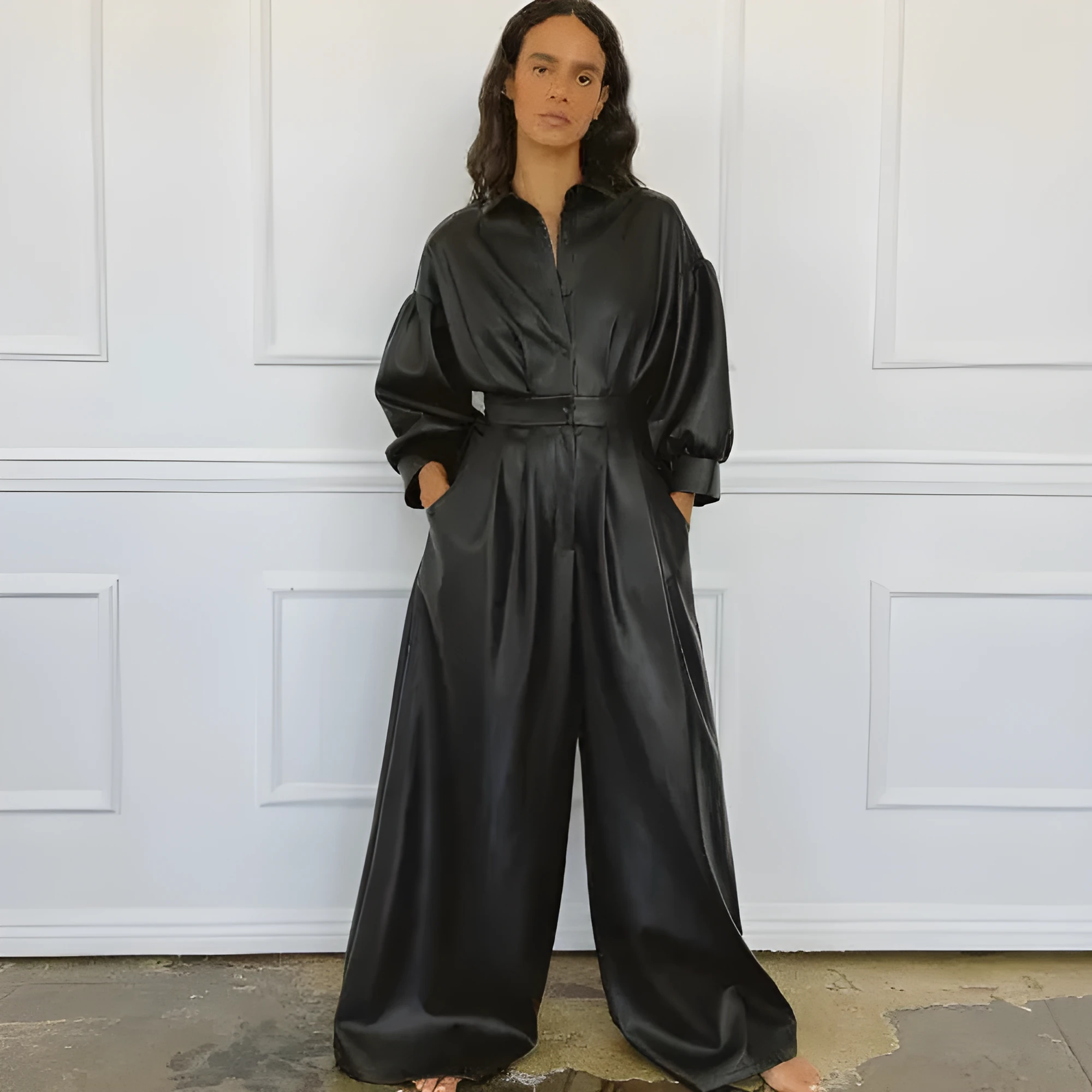 Black PU retro loose jumpsuit with puff sleeves, high waist, button front, and splicing details