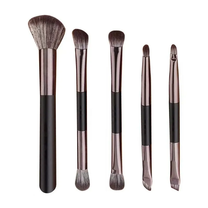 Makeup brush set with mirror showing artificial fibre bristles and plastic handles