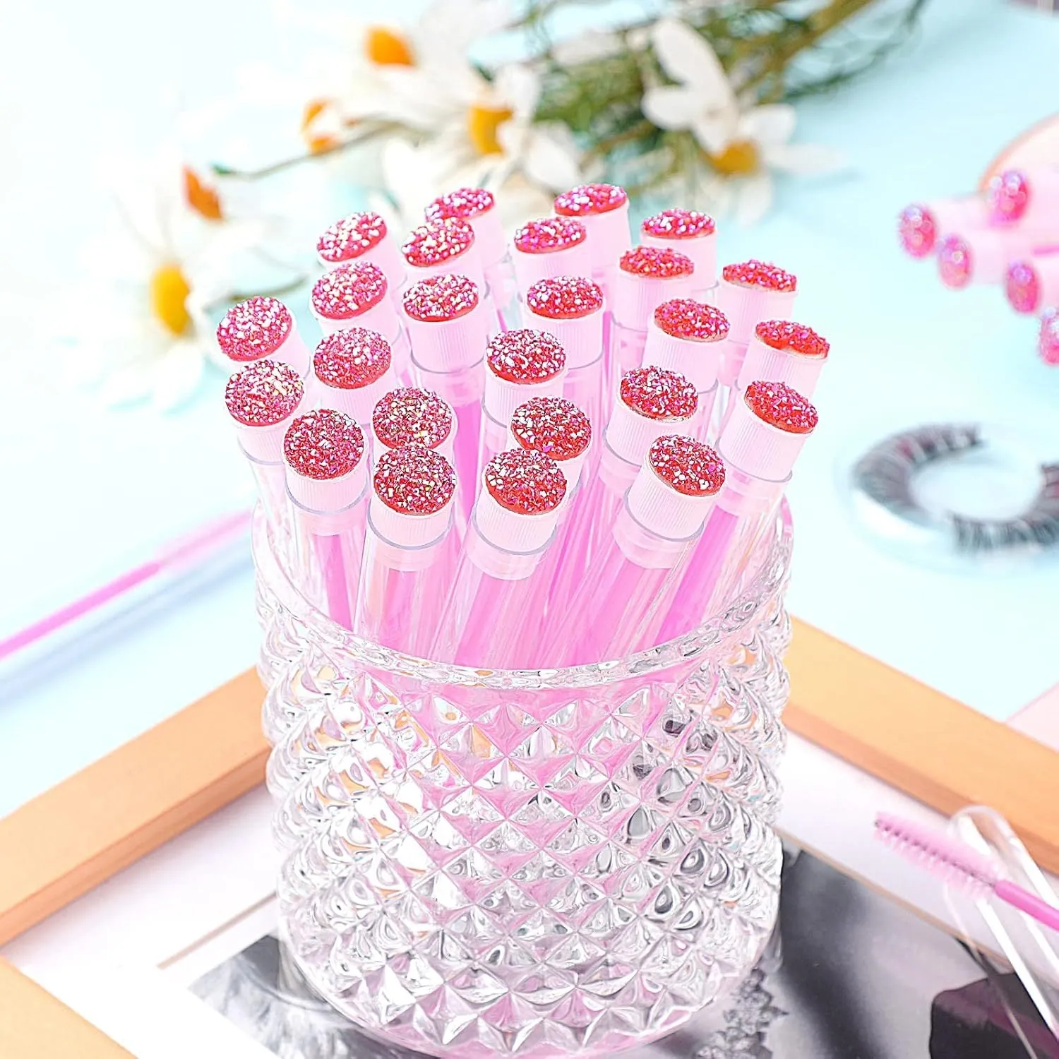 Disposable eyelash brushes with transparent storage tubes in four colours