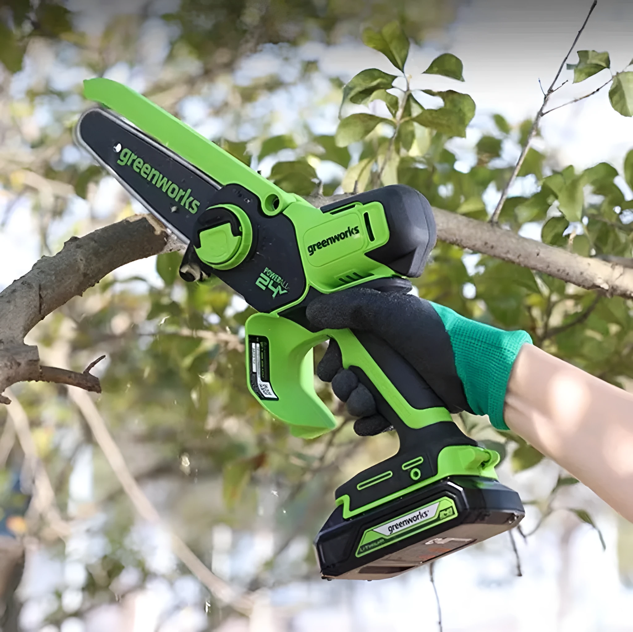 6-inch small electric chain saw with 24V lithium battery, 400W motor, and EU charger shown on white background