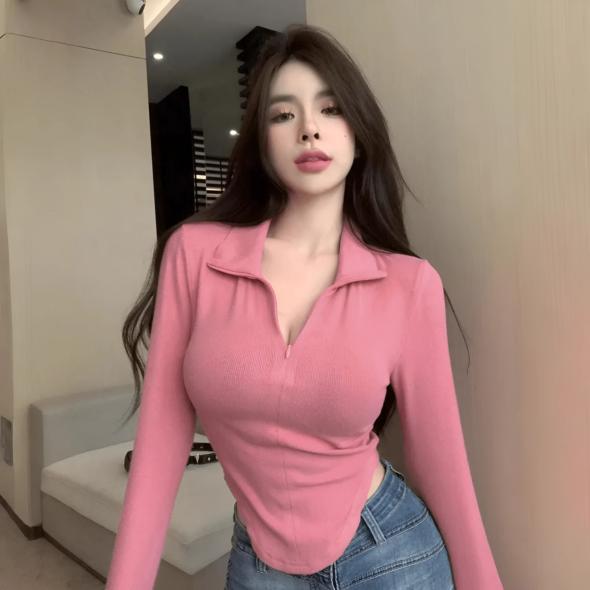 Women's slim fit stand collar long-sleeved t-shirt in peach colour, polyester knit, front view