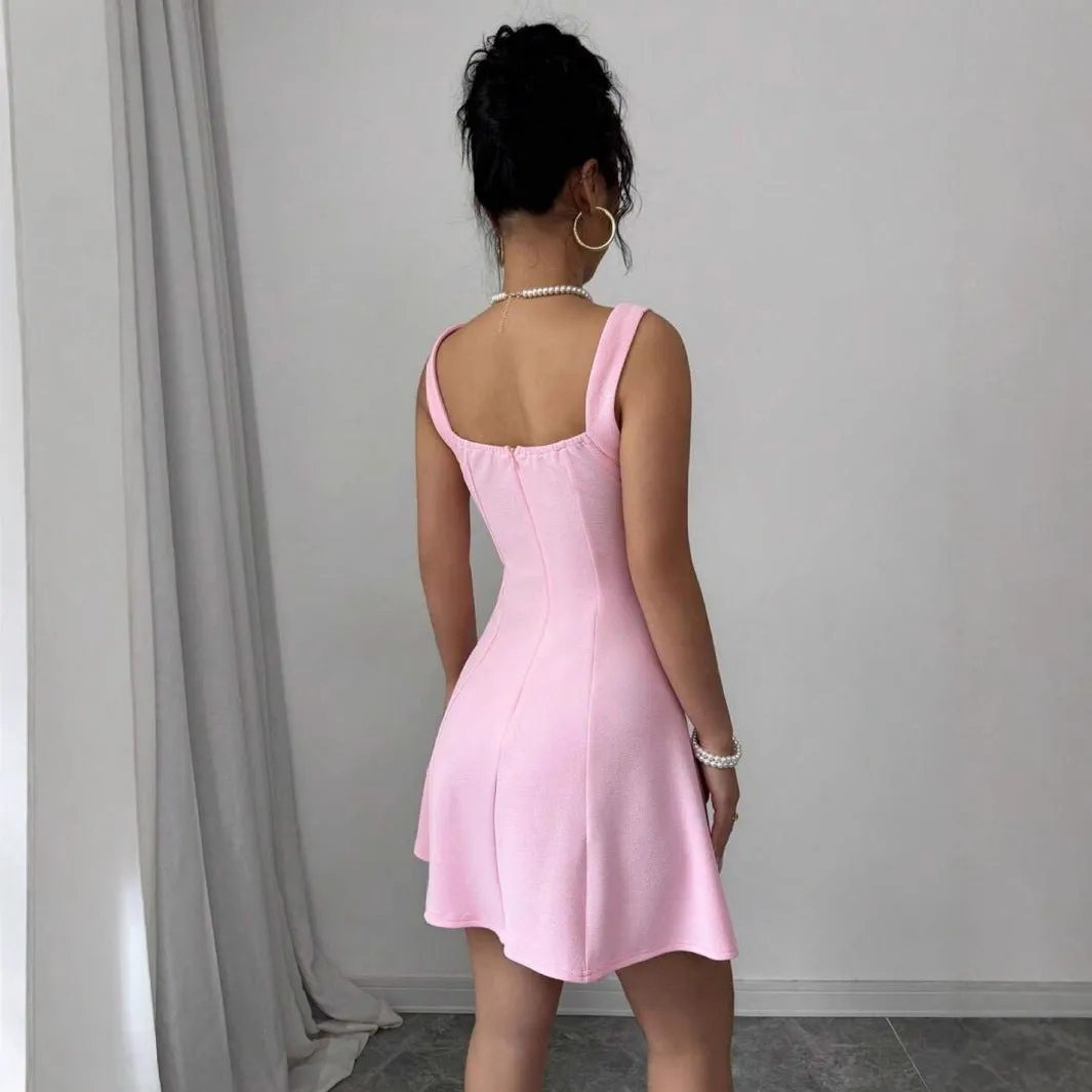 Pink high-waist suspender dress with A-line skirt and sleeveless design, made from polyester.