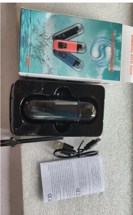 Rechargeable nose hair trimmer with digital display and removable cutter head.