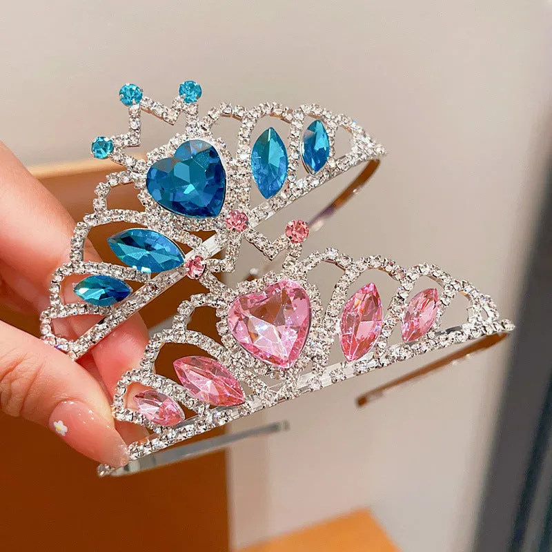 Children's metal alloy crown headdress hairband in pink, light blue, or light purple with crystal decoration.