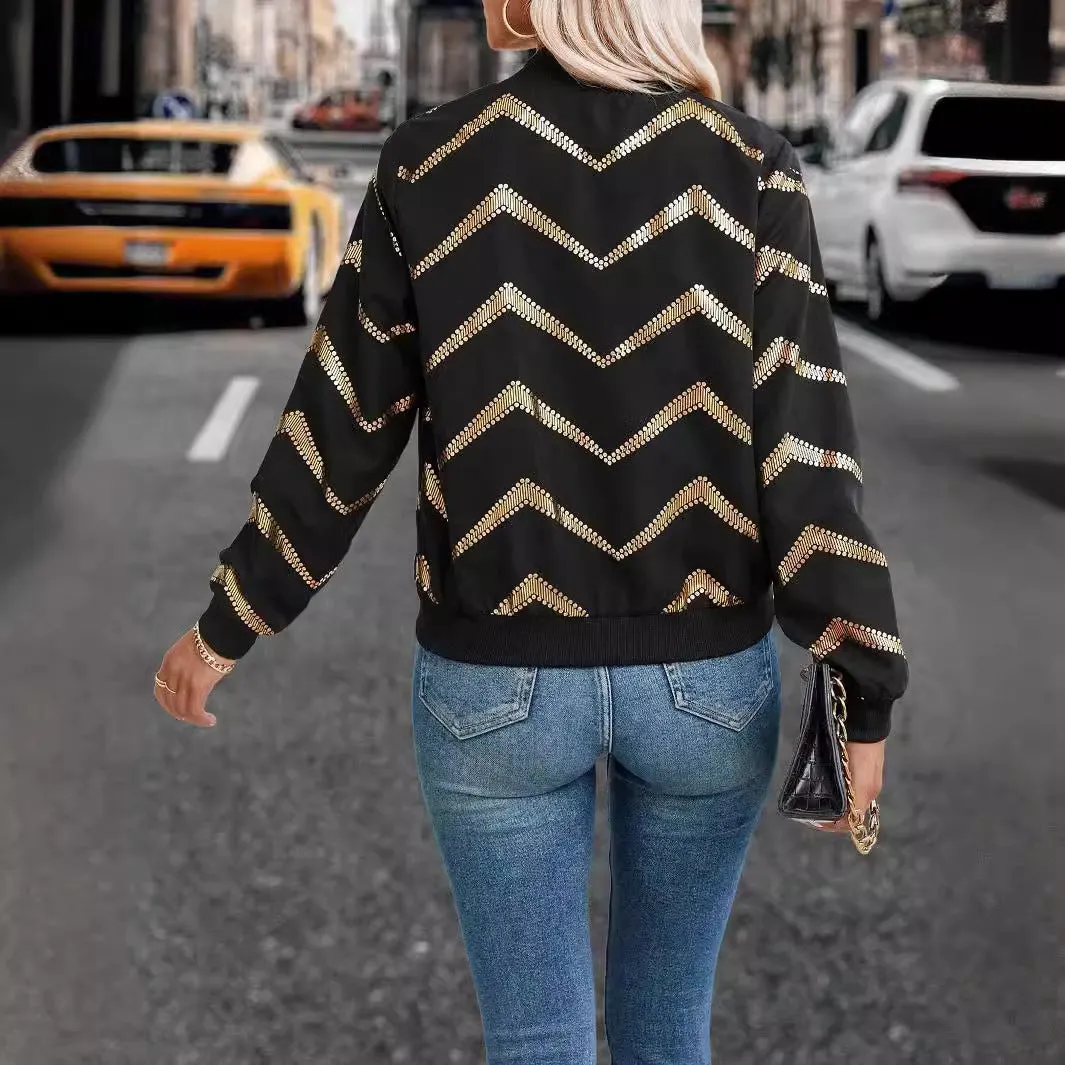 Women's black polyester spring jacket with gold zigzag print, conventional sleeves, shown on model