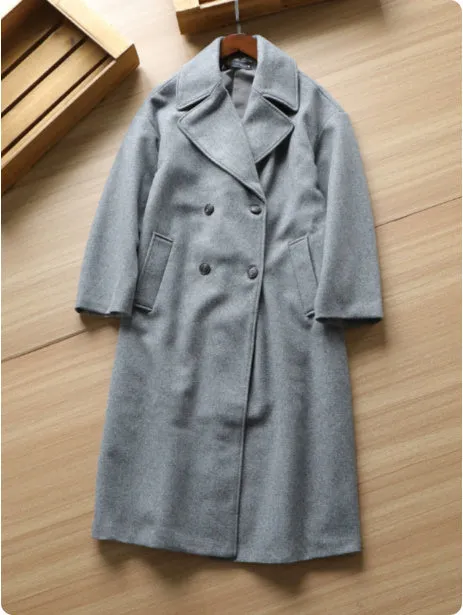 Gray mid-length double breasted woolen coat for women with button front and loose fit