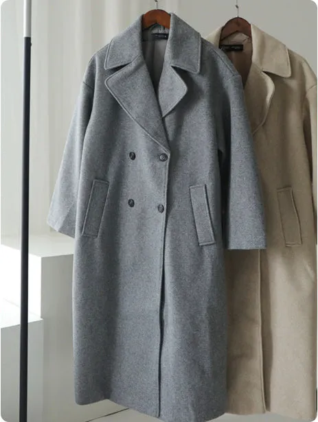 Gray mid-length double breasted woolen coat for women with button front and loose fit
