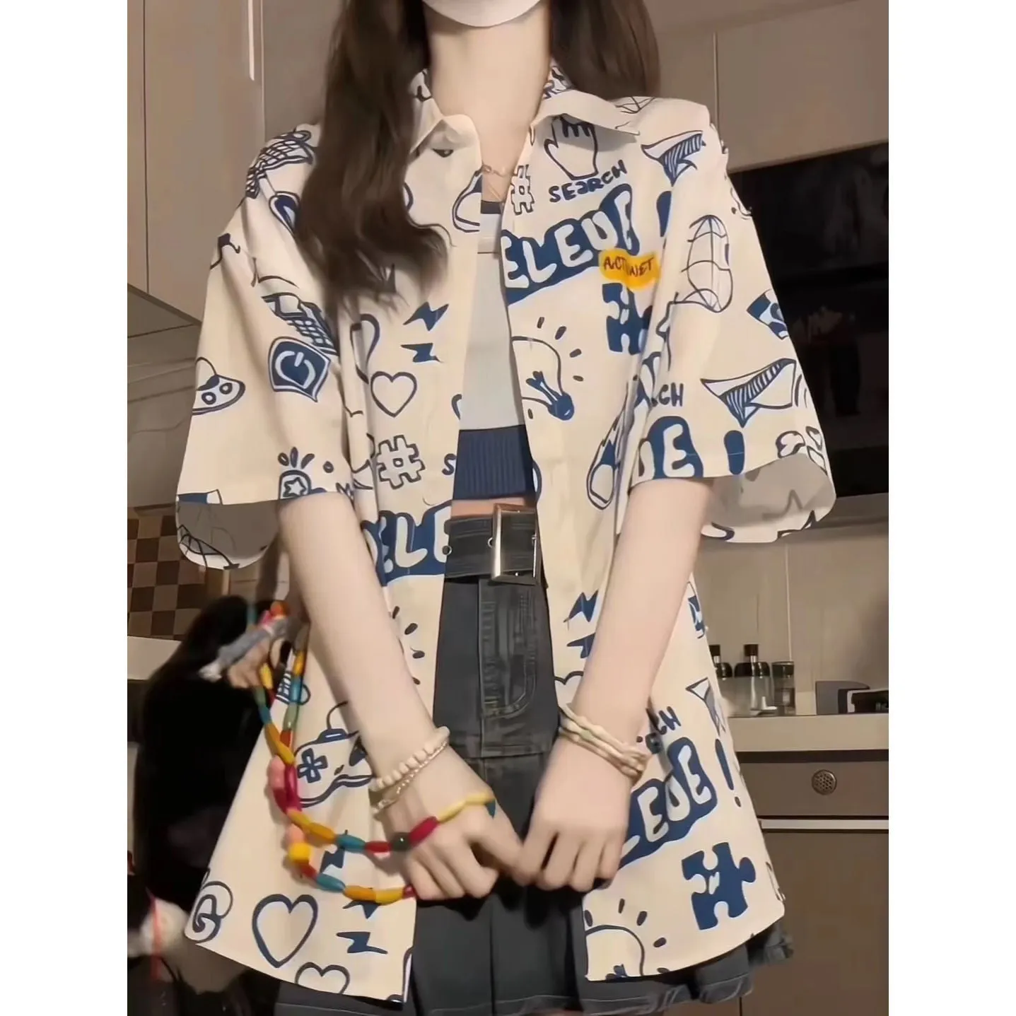 Student loose fit polyester shirt with cartoon animation print in dark blue video game graffiti design