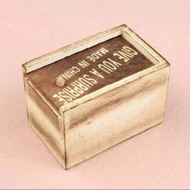 Small camellia wood trick box with spider pop-out surprise prank for youth