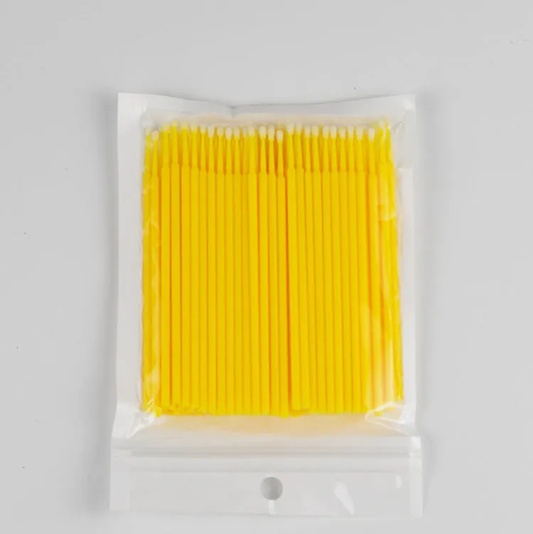 Disposable micro applicator brushes with bendable shafts and flock tips for makeup application
