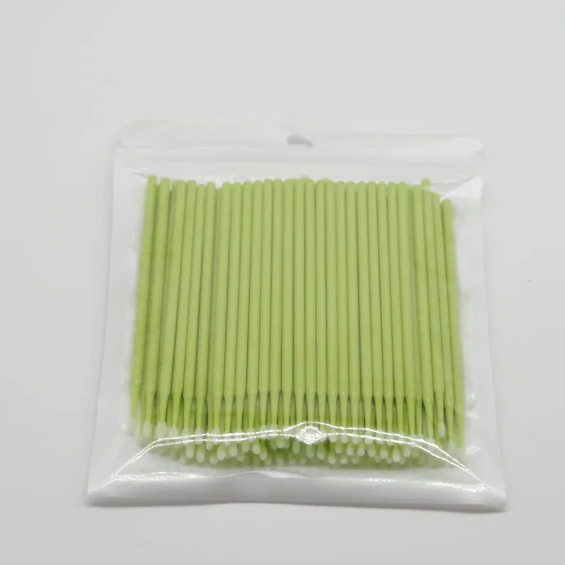 Disposable micro applicator brushes with bendable shafts and flock tips for makeup application