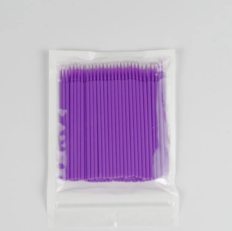 Disposable micro applicator brushes with bendable shafts and flock tips for makeup application