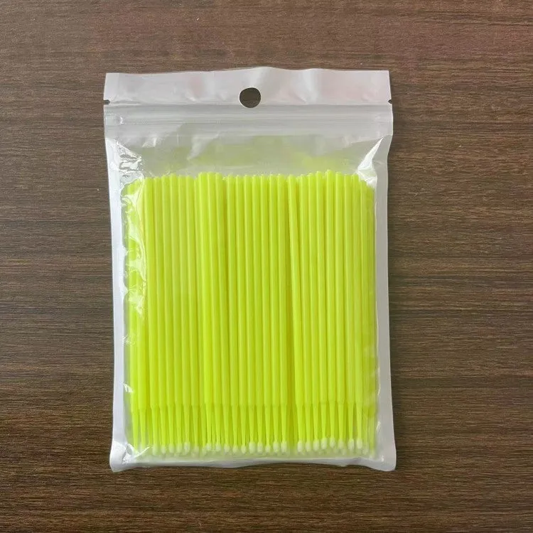 Disposable micro applicator brushes with bendable shafts and flock tips for makeup application