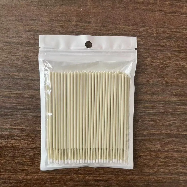 Disposable micro applicator brushes with bendable shafts and flock tips for makeup application