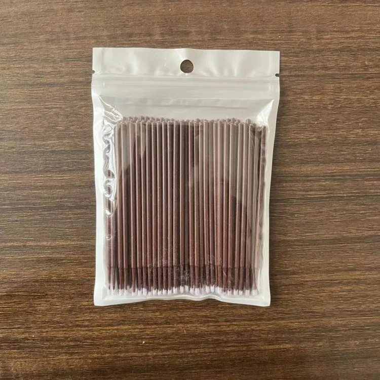 Disposable micro applicator brushes with bendable shafts and flock tips for makeup application