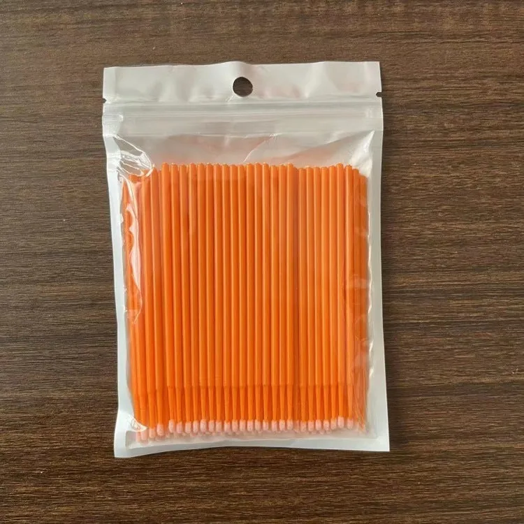 Disposable micro applicator brushes with bendable shafts and flock tips for makeup application