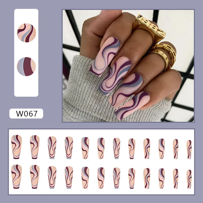 Pack of Ballet W067 wave line patterned nail stickers with pots of jelly glue on a pink background.