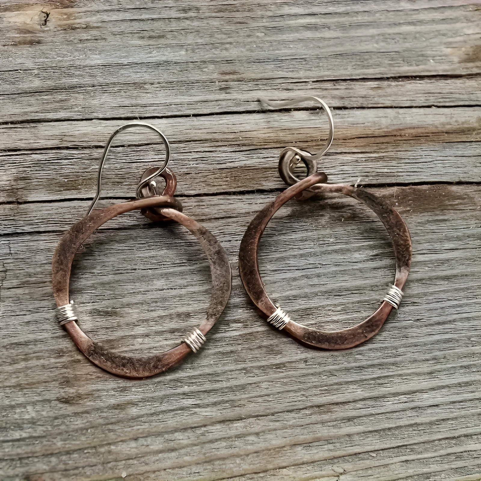 Retro hollow round bohemian earrings with bronze finish cable trim on female ear