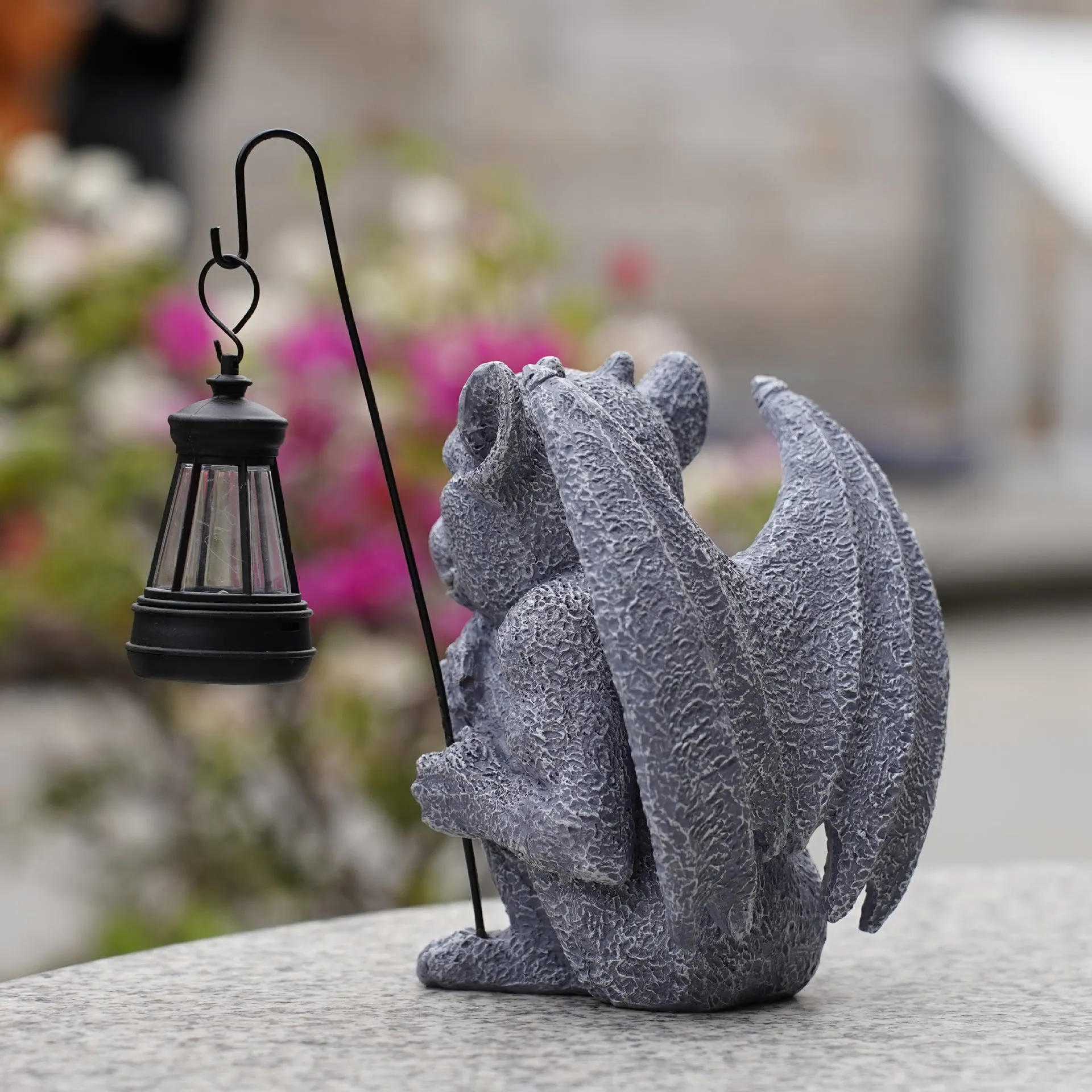 Resin stone statue ghost solar lamp with integrated solar panel on top of ghost head
