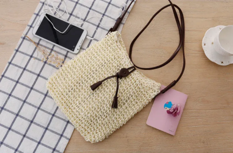 Handmade crochet crossbody straw bag for children in khaki with cotton lining and woven texture