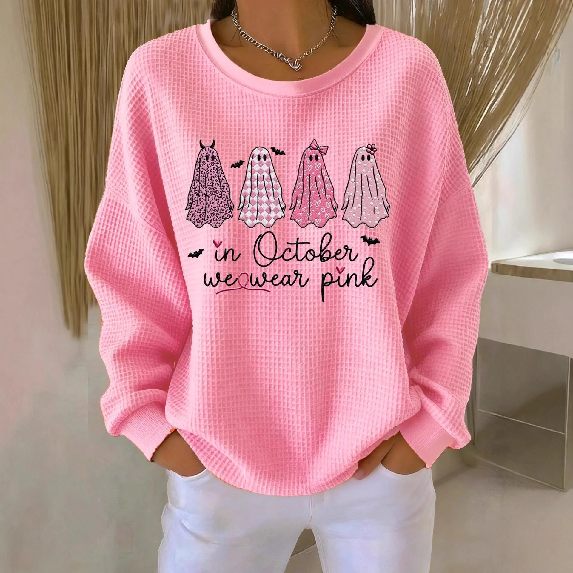 Women's loose-fitting casual pullover with 3D effect pattern in polyester, available in multiple colours