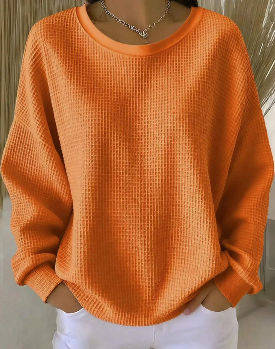 Women's loose-fitting casual pullover with 3D effect pattern in polyester, available in multiple colours