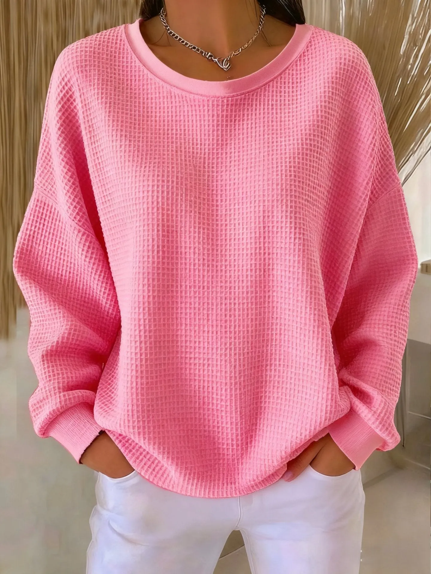 Women's loose-fitting casual pullover with 3D effect pattern in polyester, available in multiple colours