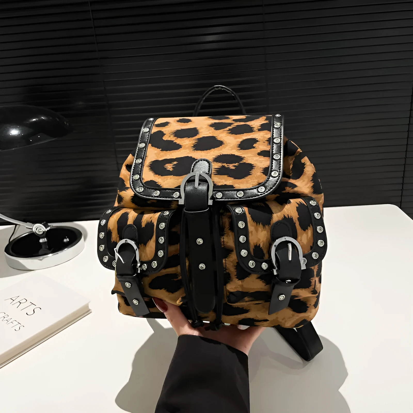 Leopard print flip backpack in urban simplicity style, available in Black, Brown, Khaki, Rose Red, with PU construction and polyester lining