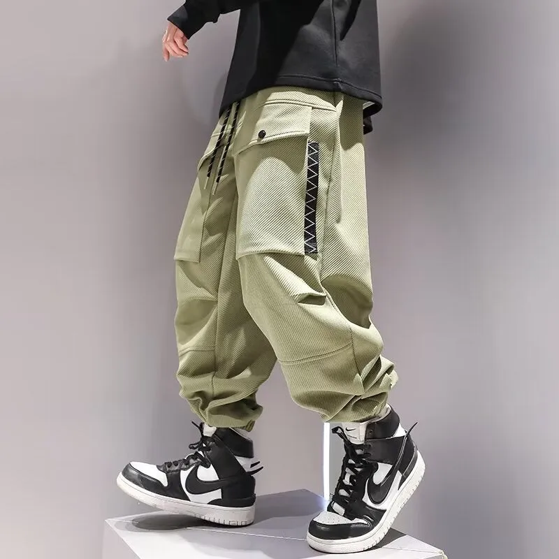 Plus-sized high waist drawstring big pocket teen trousers in black and green, size M to XXXL