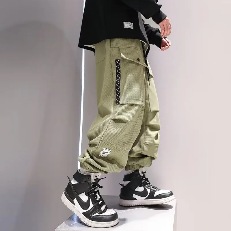 Plus-sized high waist drawstring big pocket teen trousers in black and green, size M to XXXL