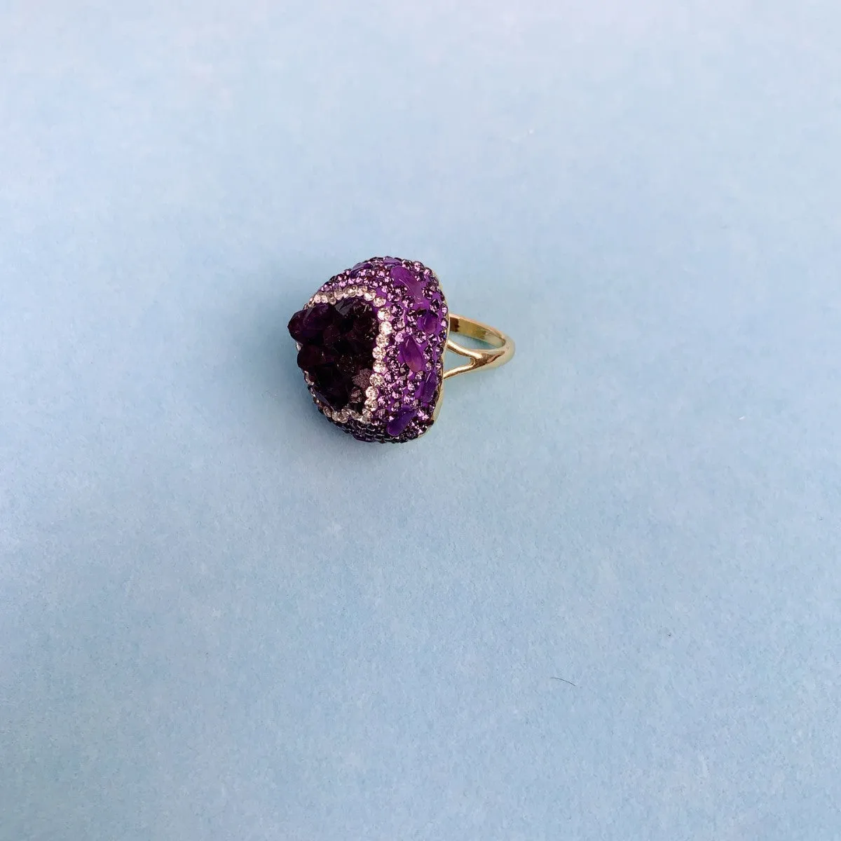 Natural Uruguay amethyst open adjustable ring on a white background showing the gemstone and open band design